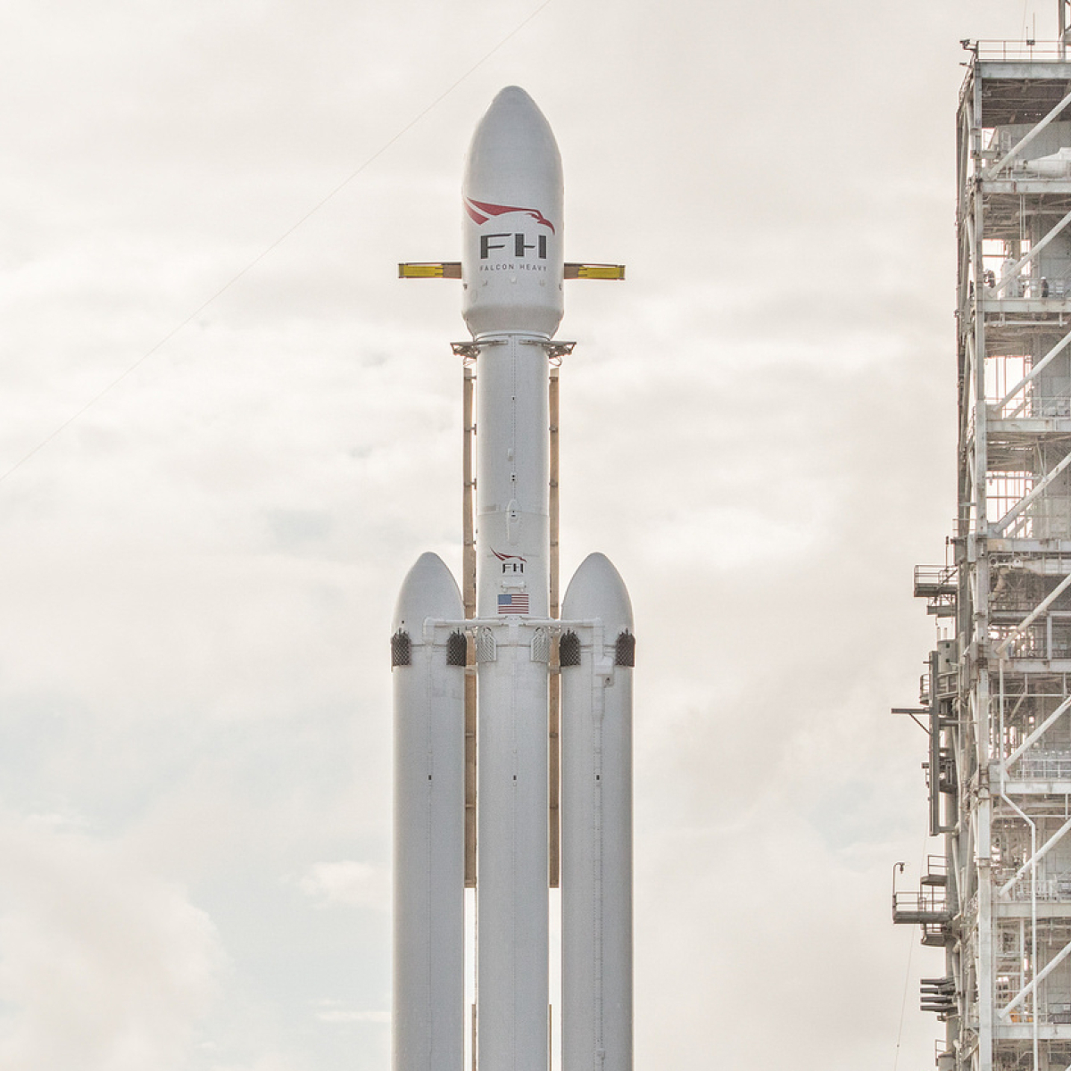 Falcon heavy standing vertical on launch pad